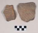 Coarse earthenware body sherds, incised and cord impressed, with shell temper