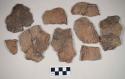 Coarse earthenware body sherds, cord impressed; some sherds crossmended with glue; all sherds crossmend