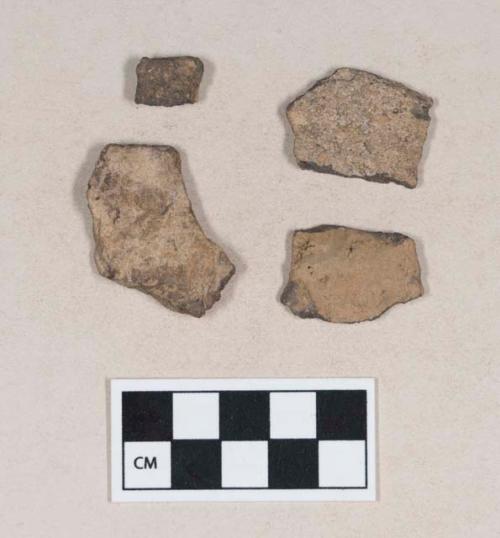 Coarse earthenware body sherds, undecorated; two sherds crossmend