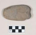 Ground stone, flat ovoid object, chipped on both sides