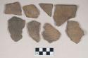 Ceramic, earthenware body sherds, cord-impressed; ceramic, earthenware rim sherds, flared rim, cord-impressed, two sherds crossmend