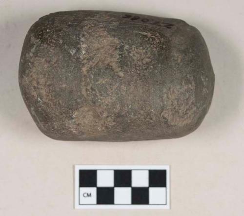 Ground stone, possibly pitted