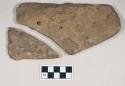 Chipped stone, tool, bifacially worked, triangular; worked along three edges, with fourth edge rounded