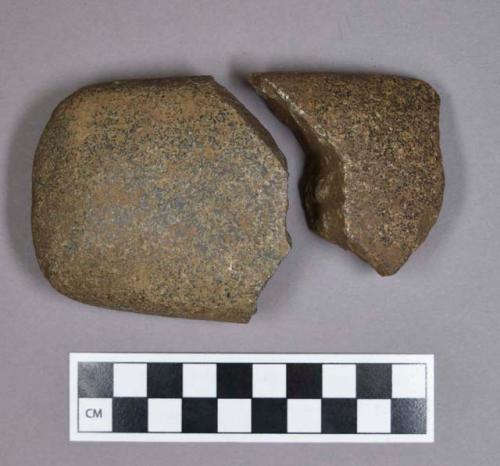 Ground stone axe, two fragments, cross-mend