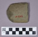 Ground stone, fragment