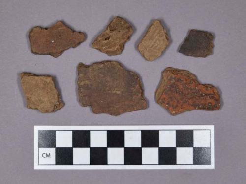 Ceramic, earthenware body sherds, including undecorated, cord-impressed, dentate, and incised decorated