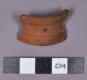 Ceramic, red earthenware fragment, perforated and grooved, spool-shaped