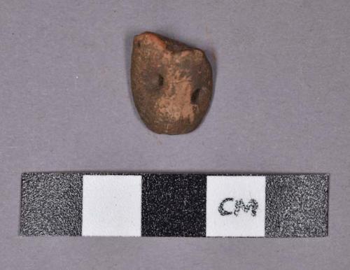 Ceramic, red earthenware sherd with two partially perforated holes on convex surface