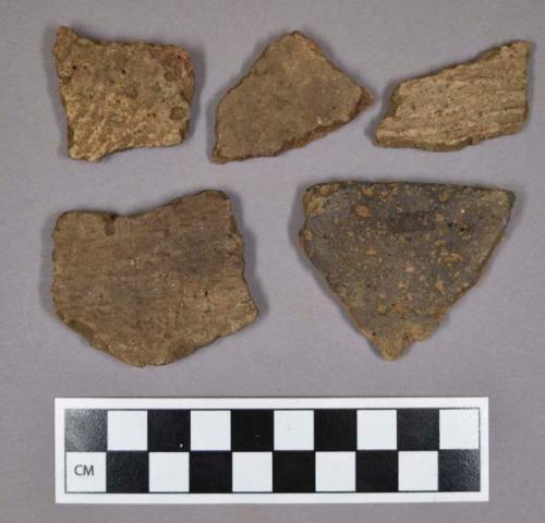 Ceramic, earthenware body and rim sherds, including undecorated, cord-impressed decorated, and grit-tempered