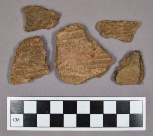 Ceramic, earthenware body sherds, including undecorated and cord-impressed