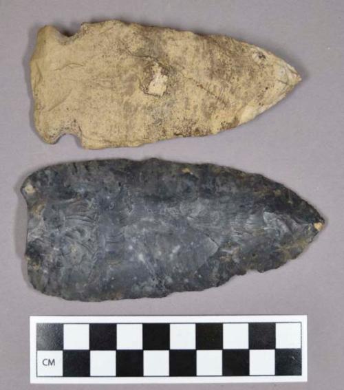 Chipped stone, spear projectile points, one side-notched and one blade fragment