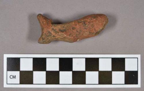 Ceramic, earthenware figurine sherd, shell-tempered; possible leg fragment