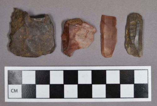 Chipped stone, chipping debris, flakes, prismatic blades, and bifacial fragments, including chert and quartz