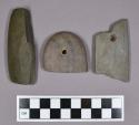 Ground stone, perforated, gorget fragments and one atlatl weight fragment