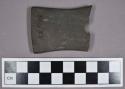 Ground stone, gorget fragment, one perforation