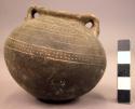 Pottery jar, with handles, incised ornament