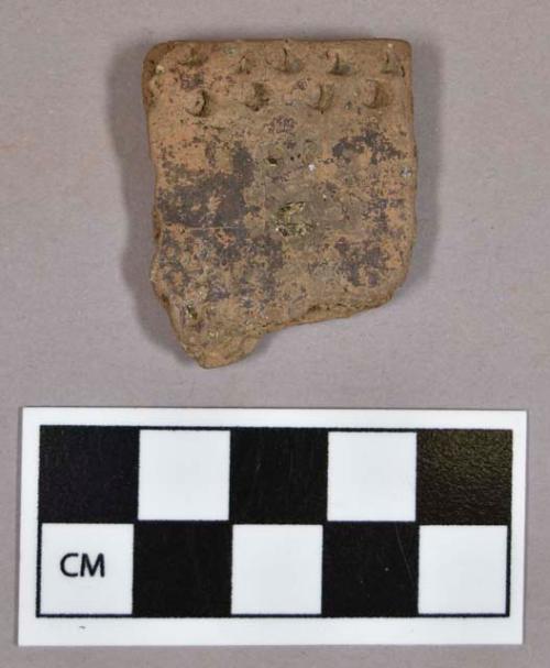 Ceramic, earthenware rim sherd, incised and punctate rim decoration