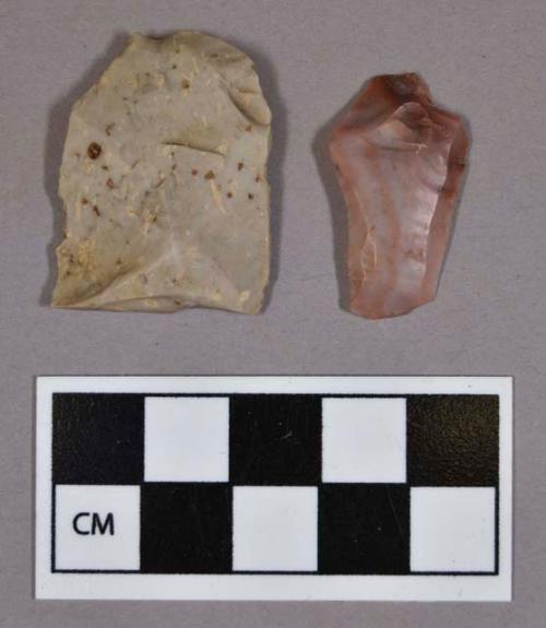 Chipped stone, one modified flake and one chert prismatic blade