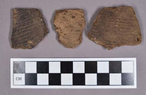 Ceramic, earthenware body and rim sherds, cord-impressed