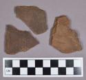 Ceramic, earthenware body and rim sherds, incised and punctate decoration, one sampled for thin section