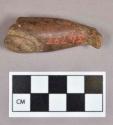 Ceramic, earthenware figurine fragment, foot and leg