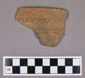 Ceramic, earthenware rim sherd, incised and punctate rim decoration, incised on body