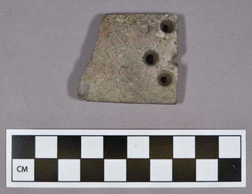 Ground stone, gorget fragment, four perforations