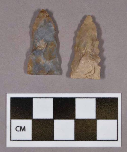 Chipped stone, triangular projectile points, one serrated