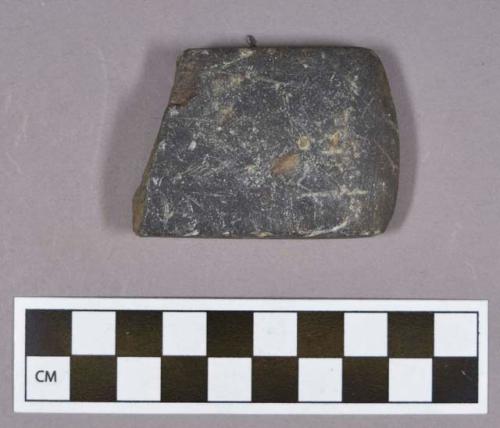 Ground stone, adze, blade fragment, incised edges