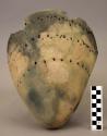 2 potsherds-pit and comb ornamented