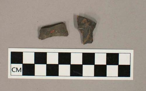 Chipped stone projectile point bases, including one stemmed