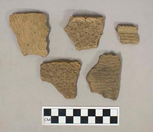 Ceramic, earthenware, body and rim sherds including punctate, incised, and impressed decoration