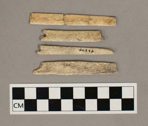 Worked bone matting needle fragments, including two with perforations