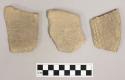 3 earthenware rim sherds with incised decoration