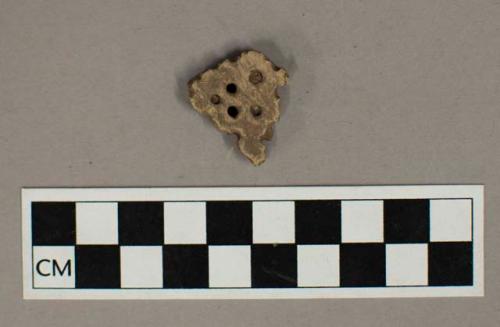 Perforated body potsherd