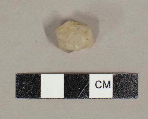 Very small quartzite core from which minute flakes have been struck