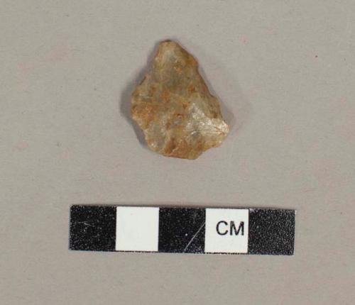 Small worked quartzite flake - triangular point?