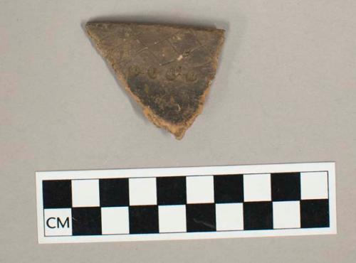 Ceramic rim sherd, incised and punctate design