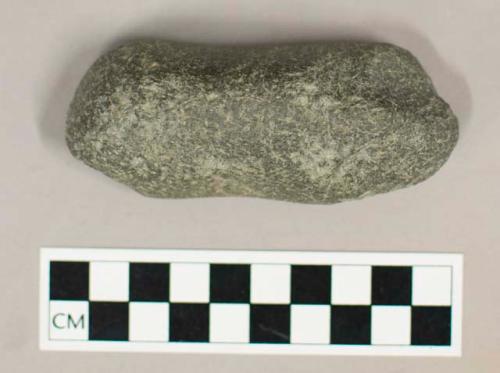 Ground stone implement