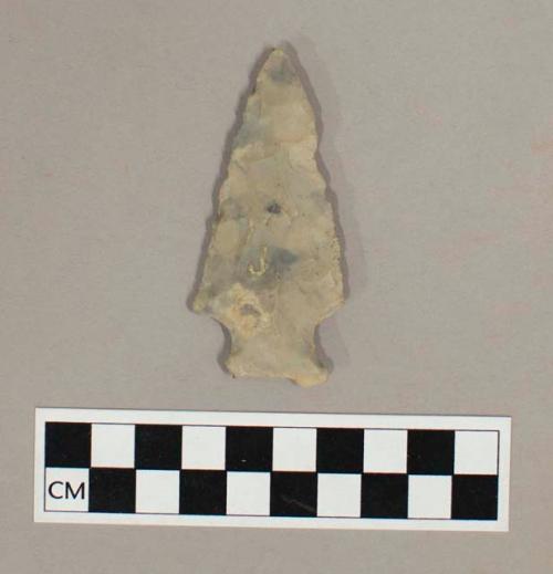 Chipped stone projectile point, side-notched, broken at base, chert.