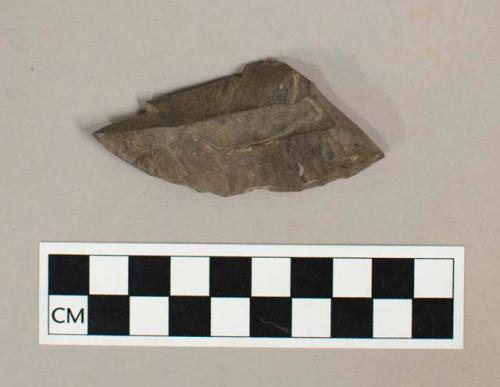 Chipped stone, biface fragment, worn