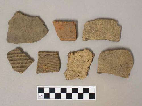 Ceramic, earthenware, body and rim sherds including punctate, incised, and impressed decoration