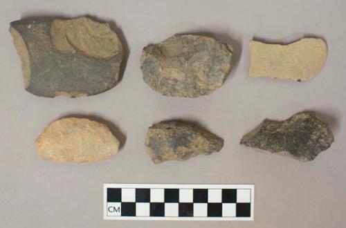 Chipped and non-cultural stone, including uniface fragment and primary flakes