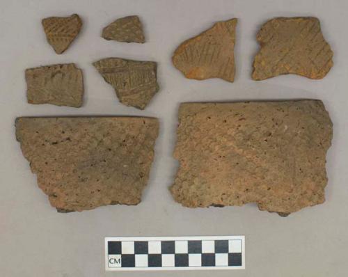 Ceramic, earthenware, body and rim sherds including punctate, incised, and impressed decoration