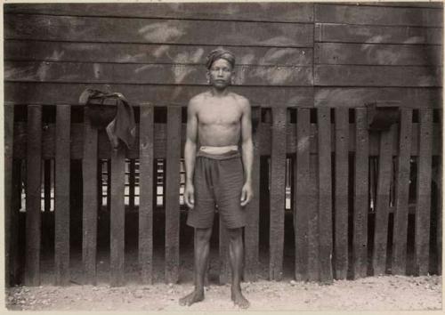 Man standing in front of a building