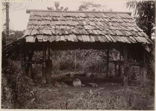 Stone implements under shelter