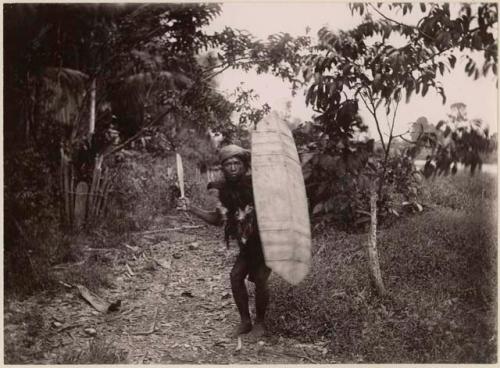 Man with shield and weapon