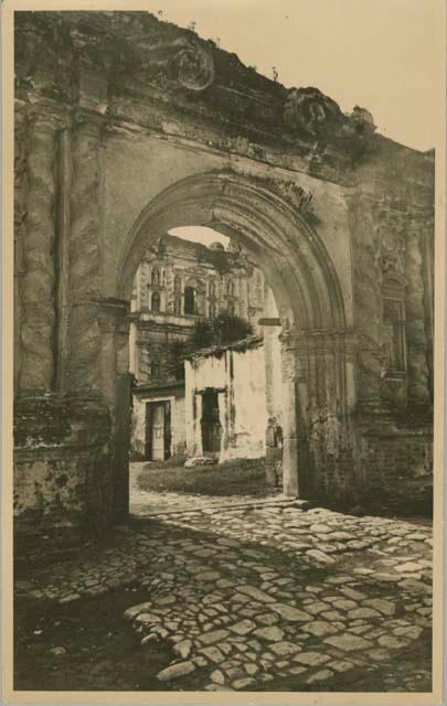 Arched building with stone walkway