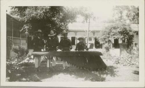 Patio of the El Manchen Hotel, men playing a kind of xylophone