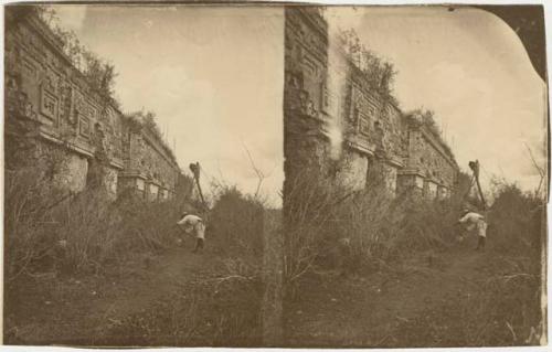 East façade of Governor's house, Dr. Le Plongeon on ladder tripod